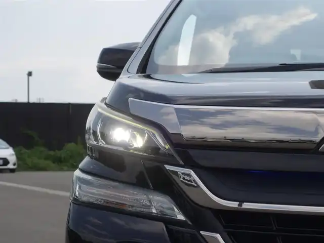 トヨタ ヴェルファイア Z 山形県 2015(平27)年 5.2万km バーニングブラッククリスタルシャインガラスフレーク 4WD/メモリナビ/　　【CD DVD BT フルセグ USB】/バックカメラ/パワースライドドア/LEDオートヘッドライト/オットマン/純正18インチアルミホイール/アイドリングストップ/コーナーセンサー/ステアリングスイッチ/MTモード付AT/電動格納ウィンカーミラー/フォグランプ/フロアマット/ドアバイザ―/スマートキー/ETC