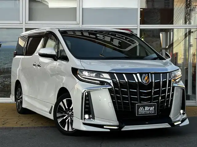 トヨタ アルファード S Cパッケージ 道北・旭川 2023(令5)年 2.4万km ホワイトパールクリスタルシャイン 純正ディスプレイオーディオ/フルセグTV/バックカメラ/純正フリップダウンモニター/純正DVDプレーヤー/TRDエアロ（フロント、サイド、リア）/TRDハイレスポンスマフラー/レザーシート/メモリーシート/前席シートヒーター＆クーラー/両側パワースライドドア/パワーバックドア/社外ドライブレコーダー/クルーズコントロール/ステアリングヒーター/シーケンシャルウィンカー/コーナーセンサー/純正エンジンスターター/純正バイカラーフォグランプ/ウェルカムライト