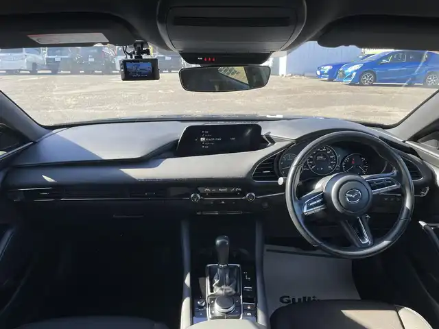 マツダ マツダ３ファストバック 15S ツーリング 福島県 2021(令3)年 3.5万km マシーングレープレミアムM i-ACTIVESENSE/ヘッドアップディスプレイ/純正SDナビ/（BT/USB/HDMI/フルセグTV/AM/FM）/バックカメラ/ブラインドスポットモニター/レーンキープアシスト/前後コーナーセンサー/オートホールド/LEDヘッドライト/オートハイビーム/オートワイパー/ETC/ドライブレコーダー前後/純正18インチAW/プッシュスタート/スマートキー