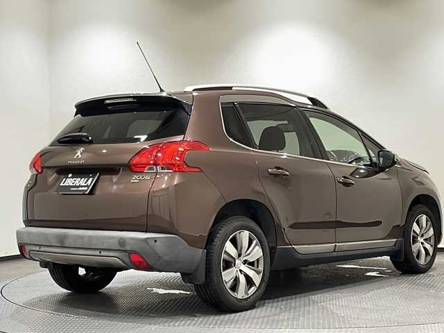 プジョー ２００８ シエロ 新潟県 2014(平26)年 7.6万km 茶 ガラスルーフ/純正ディスプレイオーディオ/ETC/クルーズコントロール/HIDヘッドライト/純正アルミホイール/ハーフレザーシート