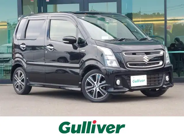 スズキ ワゴンＲ スティングレー HYBRID T 東京都 2018(平30)年 7.6万km ブルーイッシュブラックパール3 スズキセーフティサポート/・デュアルセンサーブレーキサポート/・車線逸脱警報機能/・先行車発進お知らせ機能/・誤発進抑制機能/・クルーズコントロール/・ヘッドアップディスプレイ/プッシュスタート/アイドリングストップ/パドルシフト/ストラーダナビ/フルセグTV/バックカメラ/ETC/前後ドライブレコーダー CS-91FH/運転席シートヒーター/LEDヘッドライト/オートライト/ドアバイザー/15インチ純正アルミホイール/スマートキー