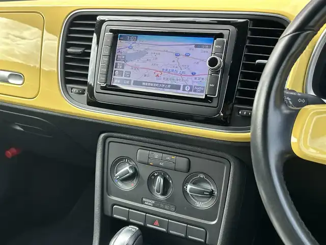 フォルクスワーゲン ザ・ビートル 福岡県 2015(平27)年 3.5万km 黄Ｍ クルーズコントロール　/純正ＳＤナビ　/バックカメラ　/Ｂｌｕｅｔｏｏｔｈ　/フルセグＴＶ　/ＨＩＤヘッドライト　/オートライト　/フロントフォグランプ/リアフォグランプ　/ドライブレコーダー/純正１６インチアルミホイール