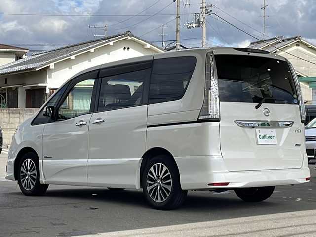 日産 セレナ ハイウェイスター Sハイブリッド 愛媛県 2014(平26)年 10.3万km ホワイト 社外メモリナビ /・Bluetooth接続/・CD/DVDS再生/・AM/FM/バックカメラ/ETC/両側パワースライドドア/3列シート/ウォークスルー/オートライト/車線逸脱警報/横滑り防止装置/スマートキー/スペアキー/プッシュスタート/保証書/取扱説明書