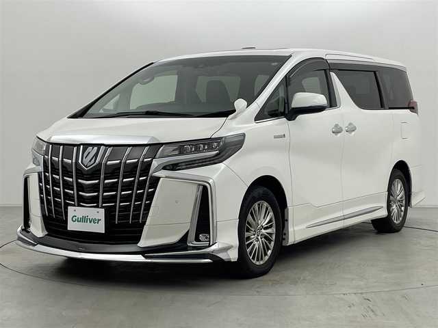 トヨタ アルファードハイブリット SR Cパッケージ 群馬県 2021(令3)年 5.7万km ホワイトパールクリスタルシャイン ツインムーンルーフ/＝＝＝＝＝/純正9インチナビ/・AM/FM/Bletooth/フルセグTV/・USB/AppleCarPlay/AndroidAuto/純正フリップダウンモニター/パワーバックドア/両側パワースライドドア/トヨタセーフティセンス/・プリクラッシュセーフティシステム/・レーントレーシングアシスト/・アダプティブハイビームシステム/・レーダークルーズコントロール(全車速追従機能付)/・ロードサインアシスト/先行車発進告知機能/三眼LEDヘッドランプ/プッシュスタート/スマートキー/電動パーキングブレーキ/オートブレーキホールド
