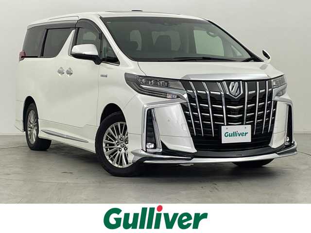 トヨタ アルファードハイブリット SR Cパッケージ 群馬県 2021(令3)年 5.7万km ホワイトパールクリスタルシャイン ツインムーンルーフ/＝＝＝＝＝/純正9インチナビ/・AM/FM/Bletooth/フルセグTV/・USB/AppleCarPlay/AndroidAuto/純正フリップダウンモニター/パワーバックドア/両側パワースライドドア/トヨタセーフティセンス/・プリクラッシュセーフティシステム/・レーントレーシングアシスト/・アダプティブハイビームシステム/・レーダークルーズコントロール(全車速追従機能付)/・ロードサインアシスト/先行車発進告知機能/三眼LEDヘッドランプ/プッシュスタート/スマートキー/電動パーキングブレーキ/オートブレーキホールド