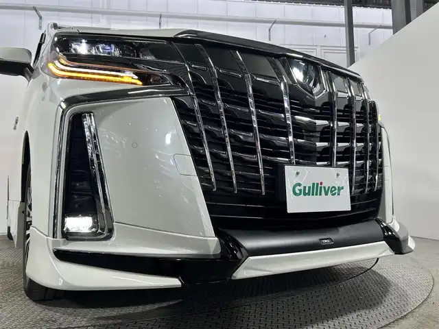 トヨタ アルファード S Cパッケージ 大阪府 2022(令4)年 1.7万km ホワイトパールクリスタルシャイン サンルーフ　黒革シート　ＴＲＤエアロ　三眼ＬＥＤ　後席モニター　純正ナビＴＶ　Ｂカメラ　デジタルインナーミラー　パワーシート／ヒーター／エアコン　電動リアゲート　衝突軽減　レーダーＣ　ＢＳＭ　