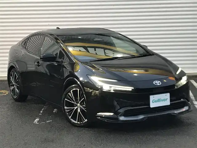 トヨタ プリウス Z 和歌山県 2023(令5)年 5.9万km アティチュードブラックマイカ 純正12.3型ディスプレイオーディオ/(TV/BT/AM/FM/AppleCarPlay/Miracast対応)/パワーバックドア/ビルトインETC2.0/レーダークルーズコントロール/クリアランスソナー/セーフティセンス/・プリクラッシュセーフティ/・レーンチェンジアシスト/・レーントレーシングアシスト/・レーンディパーチャーアラート/・パーキングアシスト/・オートマチックハイビーム/・ロードサインアシスト/・発進遅れ告知機能/・ブラインドスポットモニター/デジタルインナーミラー/LEDヘッドランプ/合皮巻きステアリング/ステアリングヒーター/前席シートヒーター/ベンチレーション/運転席メモリー付パワーシート/純正19インチアルミホイール/スマートエントリー/スタートシステム/スペアキーX1/保証書