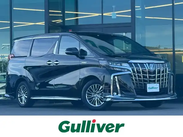 トヨタ アルファードハイブリット エグゼクティブ ラウンジ S 東京都 2021(令3)年 2.3万km ブラック ダブルサンルーフ/JBLサウンドシステム/純正メーカーナビ/CD/DVD/BT/AM/FM/USB/HDMI/TV/パノラミックビューモニター/リアエンターテイメント/電動サイドステップ/両側パワースライドドア/AC1500W/セーフティセンス/プリクラッシュセーフティ/レーントレーシングアシスト/オートハイビーム/レーダークルーズコントロール/クリアランスソナー/モデリスタエアロ/電動リアゲート/本革シート/シートヒーター/ベンチレーション/ステアリングヒーター