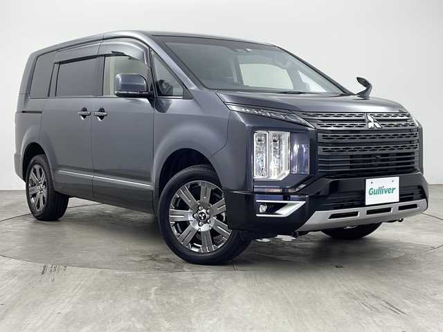 三菱 デリカＤ：５ ジャスパー 兵庫県 2022(令4)年 2.6万km グラファイトグレーメタリック/ブラックマイカ ・社外フローティングナビ/・フルセグ/Bluetooth/CD/DVD/SD/・バックカメラ/・レーダークルーズ/・両側パワースライドドア/・パドルシフト/・ステアリングリモコン/・LEDヘッドライト/・フォグランプ/・オートマチックハイビーム/・ハーフレザーシート/・4WD/・ETC/・レーダー探知機/・電動パーキングブレーキ/・ブレーキホールド/・純正18インチアルミホイール/・社外フロアマット/・衝突被害軽減システム/・車線逸脱警報システム/・横滑り防止システム/・アイドリングストップ/・Wサイドエアバッグ/・カーテンエアバッグ