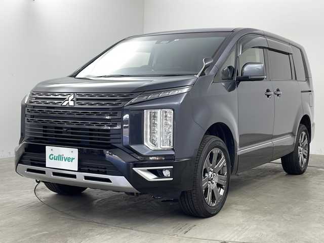三菱 デリカＤ：５ ジャスパー 兵庫県 2022(令4)年 2.6万km グラファイトグレーメタリック/ブラックマイカ ・社外フローティングナビ/・フルセグ/Bluetooth/CD/DVD/SD/・バックカメラ/・レーダークルーズ/・両側パワースライドドア/・パドルシフト/・ステアリングリモコン/・LEDヘッドライト/・フォグランプ/・オートマチックハイビーム/・ハーフレザーシート/・4WD/・ETC/・レーダー探知機/・電動パーキングブレーキ/・ブレーキホールド/・純正18インチアルミホイール/・社外フロアマット/・衝突被害軽減システム/・車線逸脱警報システム/・横滑り防止システム/・アイドリングストップ/・Wサイドエアバッグ/・カーテンエアバッグ