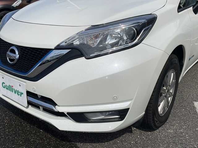 日産 ノート e－パワー メダリスト FOUR 新潟県 2020(令2)年 7.6万km ブリリアントホワイトパール ４WD/ワンオーナー/純正メモリナビ(Bluetooth/DTV/FM/AM)/バックカメラ/プッシュスタート/アイドリングストップ/純正フロアマット/ETC/ドライブレコーダー/ハーフレザーシート/社外１４インチアルミ/コーナーセンサー/電格ミラー