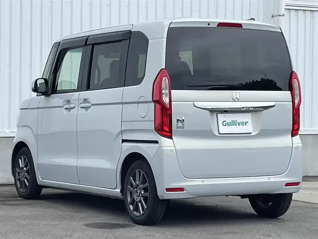 ホンダ Ｎ ＢＯＸ EX ターボ 愛媛県 2023(令5)年 1.8万km プレミアムサンライトホワイトパール ホンダセンシング/衝突被害軽減ブレーキ/レーンキープアシスト/前後誤発進抑制機能/アダプティブクルーズコントロール/ロードサインアシスト/クリアランスソナー/純正7インチナビ【VXM-235Ci】/　CD/Bluetooth/バックカメラ/前後ドライブレコーダー/ビルトインETC/プッシュスタート/前席シートヒーター/純正14インチAW/オートライト/LEDヘッドライト/バックテーブル/パドルシフト/ドアバイザー/フロアマット