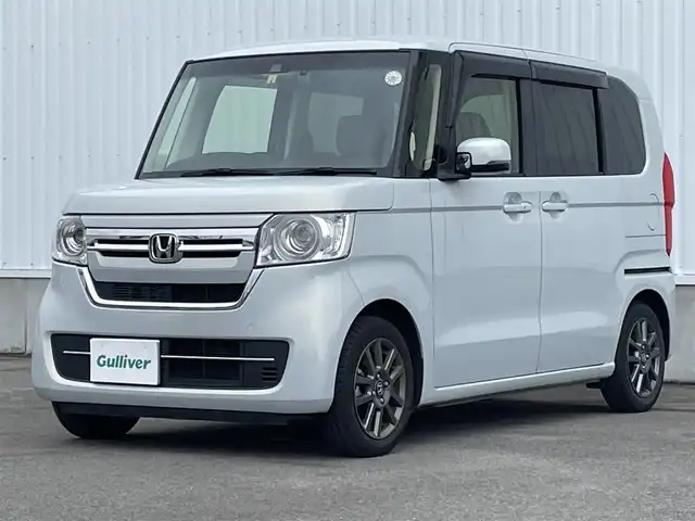 ホンダ Ｎ ＢＯＸ EX ターボ 愛媛県 2023(令5)年 1.8万km プレミアムサンライトホワイトパール ホンダセンシング/衝突被害軽減ブレーキ/レーンキープアシスト/前後誤発進抑制機能/アダプティブクルーズコントロール/ロードサインアシスト/クリアランスソナー/純正7インチナビ【VXM-235Ci】/　CD/Bluetooth/バックカメラ/前後ドライブレコーダー/ビルトインETC/プッシュスタート/前席シートヒーター/純正14インチAW/オートライト/LEDヘッドライト/バックテーブル/パドルシフト/ドアバイザー/フロアマット