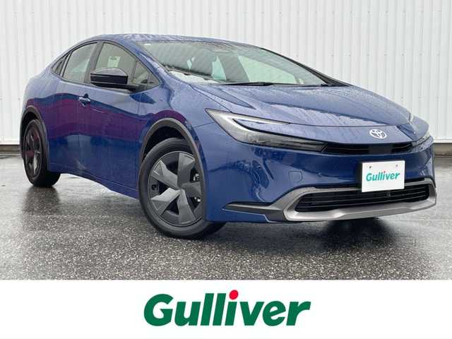 トヨタ プリウス U 滋賀県 2024(令6)年 0.2万km ダークブルー 純正ディスプレイオーディオ（BT/フルセグ）/バックカメラ/ビルトインETC2.0 /衝突軽減ブレーキ/レーンキープアシスト/盗難防止装置/パーキングアシスト/アイドリングストップ/追従クルーズコントロール/革巻きステアリング/クリアランスソナー/LEDヘッドライト/オートマチックハイビーム/ドライブレコーダー/スマートキー