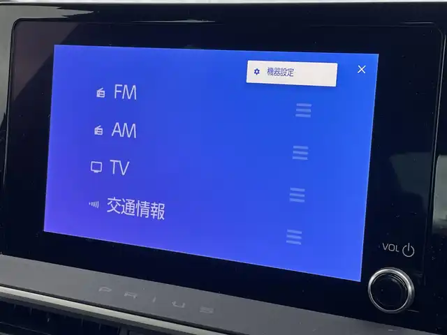 トヨタ プリウス U 滋賀県 2024(令6)年 0.2万km ダークブルー 純正ディスプレイオーディオ（BT/フルセグ）/バックカメラ/ビルトインETC2.0 /衝突軽減ブレーキ/レーンキープアシスト/盗難防止装置/パーキングアシスト/アイドリングストップ/追従クルーズコントロール/革巻きステアリング/クリアランスソナー/LEDヘッドライト/オートマチックハイビーム/ドライブレコーダー/スマートキー