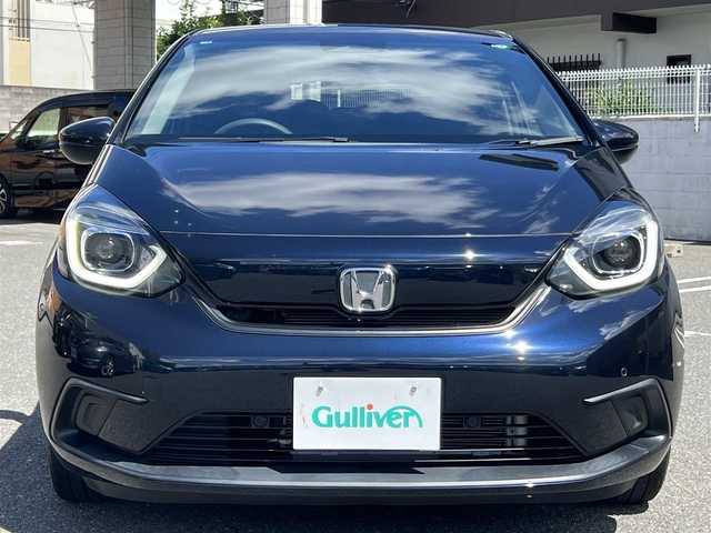 ホンダ フィット ホーム 大阪府 2020(令2)年 3万km ミッドナイトブルービームM ワンオーナー/純正9インチナビ・フルセグTV・CD・DVD・/　　　Bluetooth・USB・AUX・SD/LEDオートヘッドライト/ステアリングスイッチ/ホンダセンシング/スマートキー2個/ビルトインＥＴＣ/バックカメラ/リアスポイラー/コーナーセンサー/電動パーキングブレーキ/純正サイドドアバイザー/電動格納ウインカーミラー/アダプティブクルーズコントロール