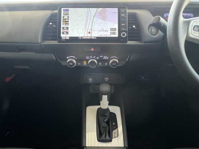 ホンダ フィット ホーム 大阪府 2020(令2)年 3万km ミッドナイトブルービームM ワンオーナー/純正9インチナビ・フルセグTV・CD・DVD・/　　　Bluetooth・USB・AUX・SD/LEDオートヘッドライト/ステアリングスイッチ/ホンダセンシング/スマートキー2個/ビルトインＥＴＣ/バックカメラ/リアスポイラー/コーナーセンサー/電動パーキングブレーキ/純正サイドドアバイザー/電動格納ウインカーミラー/アダプティブクルーズコントロール