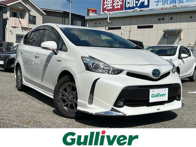 トヨタ プリウス α S チューンブラックⅡ 大分県 2016(平28)年 8.8万km ホワイトパールクリスタルシャイン ワンオーナー/純正ナビ/CD/DVD/Bluetooth/フルセグTV/バックカメラ/OP/・プリクラッシュセーフティシステムセット/ミリ波レーダー方式プリクラッシュセーフティシステム/レータークルーズ/オートマチックハイビーム/レーンディパーチャーアラート/・LEDヘッドランプセット/ブラック加飾付LEDヘッドランプ/クリアランスランプ/スマートエントリー/スタートシステム（運転席/助手席/バックドア）/・モデリスタエアロセット（F、S、Rアンダー）/ビルトインETC2.0/前席シートヒーター/純正フロアマット/ドアバイザー/純正16インチAW/運転席シートリフター/保証書/取説/スペアキー1本