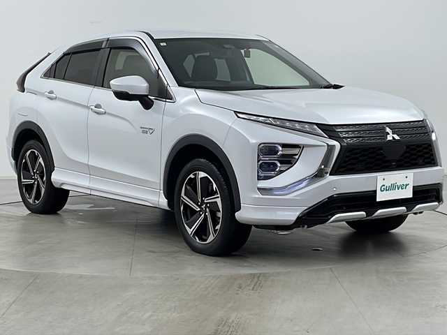 三菱 エクリプス クロス ＰＨＥＶ P 道央・札幌 2021(令3)年 2.9万km ホワイトダイヤモンド ・4WD/・寒冷地仕様/・純正ナビ&BT&USB&フルセグ/・全方位モニター/・衝突軽減ブレーキ/・レーダークルーズコントロール/・ヘッドアップディスプレイ/・ブラインドスポットモニター/・運転席パワーシート/・前席シートヒーター/・ステアリングヒーター/・ハーフレザーシート/・社外前後ドライブレコーダー/・LEDヘッドライト/・LEDフォグランプ/・純正18インチAW/・充電ケーブル有