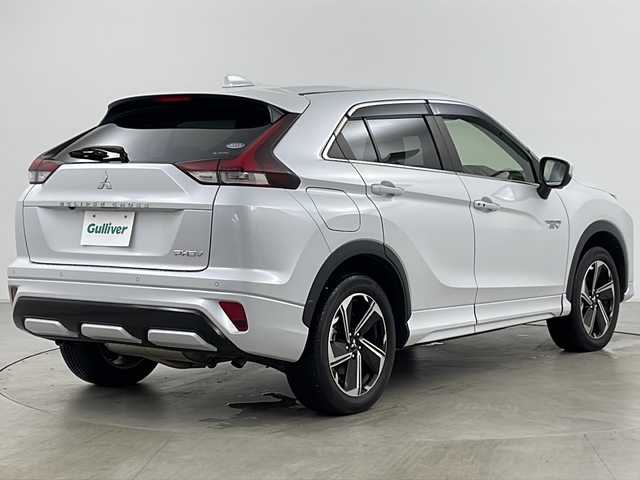三菱 エクリプス クロス ＰＨＥＶ P 道央・札幌 2021(令3)年 2.9万km ホワイトダイヤモンド ・4WD/・寒冷地仕様/・純正ナビ&BT&USB&フルセグ/・全方位モニター/・衝突軽減ブレーキ/・レーダークルーズコントロール/・ヘッドアップディスプレイ/・ブラインドスポットモニター/・運転席パワーシート/・前席シートヒーター/・ステアリングヒーター/・ハーフレザーシート/・社外前後ドライブレコーダー/・LEDヘッドライト/・LEDフォグランプ/・純正18インチAW/・充電ケーブル有
