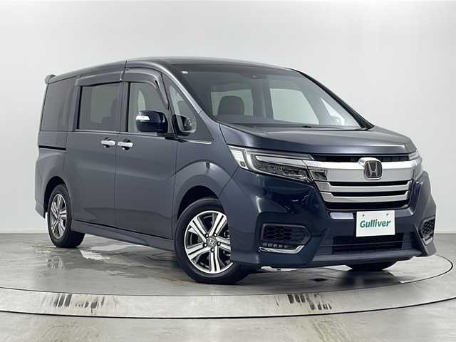 ホンダ ステップワゴン スパーダ eHEV G EXホンダS 埼玉県 2020(令2)年 4.8万km フォレストグリーンパール 後席モニター　/純正１０インチナビ　/バックカメラ　/ビルトインＥＴＣ２．０　/シートヒーター　/前後ドライブレコーダー　/両側パワースライドドア　/ホンダセンシング/　　・追従式クルーズコントロール　/　　・衝突軽減システム　/　　・レーンキープアシスト/　　・誤発進抑制機能/　　・先行車発進お知らせ機能/　　・標識認識機能/純正アルミホイール/純正フロアマット/アイドリングストップ/ドアバイザー