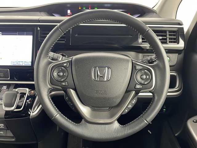 ホンダ ステップワゴン スパーダ eHEV G EXホンダS 埼玉県 2020(令2)年 4.8万km フォレストグリーンパール 後席モニター　/純正１０インチナビ　/バックカメラ　/ビルトインＥＴＣ２．０　/シートヒーター　/前後ドライブレコーダー　/両側パワースライドドア　/ホンダセンシング/　　・追従式クルーズコントロール　/　　・衝突軽減システム　/　　・レーンキープアシスト/　　・誤発進抑制機能/　　・先行車発進お知らせ機能/　　・標識認識機能/純正アルミホイール/純正フロアマット/アイドリングストップ/ドアバイザー