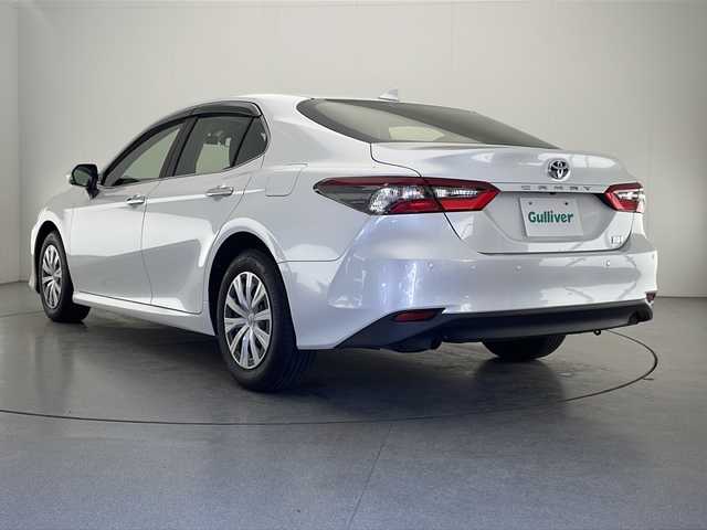 トヨタ カムリ X 宮崎県 2022(令4)年 2.4万km プラチナホワイトパールマイカ 禁煙車/トヨタセーフティセンス/純正9型ディスプレイオーディオナビTV/（T-connect/Bluetooth/FMAM/フルセグTV)/純正バックカメラ/純正ビルトインETC/純正LEDオートライト/純正LEDフォグ/純正フロアマット/社外前後ドライブレコーダー/アダプティブクルーズコントロール/プリクラッシュセーフティ/レーンディパーチャーアラート/オートマチックハイビーム/クリアランスソナー/電子パーキング/オートホールド/デュアルオートエアコン（ナノイー）/スマートキー/プッシュエンジンスタート/スペアキー/新車時保証書/取扱い説明書