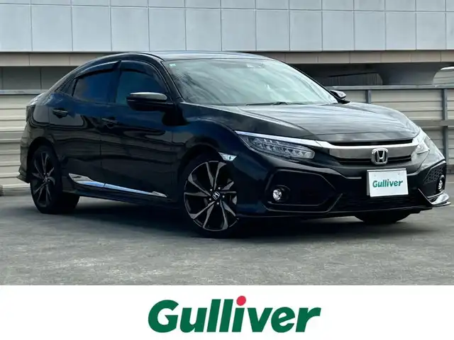 ホンダ シビック ハッチバック ホンダセンシング 静岡県 2019(令1)年 6.1万km クリスタルブラックパール 純正7インチナビ/（FM/AM/CD/DVD/iPod/Apple CarPlay）/フルセグTV/6速マニュアル/追従クルーズコントロール/ドラレコ/レーンキープアシスト/オートライト/LEDヘッドライト/シートヒーター/純正フロアマット/カーテンエアバッグ/衝突軽減システム/横滑り防止システム/純正18AW