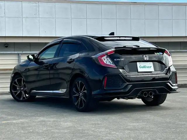 ホンダ シビック ハッチバック ホンダセンシング 静岡県 2019(令1)年 6.1万km クリスタルブラックパール 純正7インチナビ/（FM/AM/CD/DVD/iPod/Apple CarPlay）/フルセグTV/6速マニュアル/追従クルーズコントロール/ドラレコ/レーンキープアシスト/オートライト/LEDヘッドライト/シートヒーター/純正フロアマット/カーテンエアバッグ/衝突軽減システム/横滑り防止システム/純正18AW