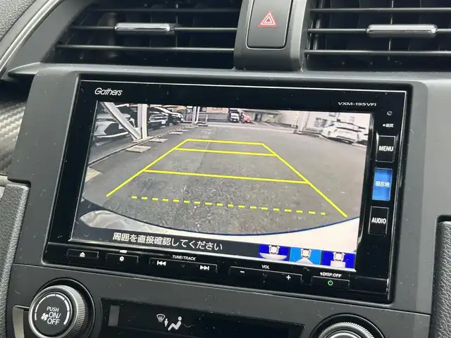 ホンダ シビック ハッチバック ホンダセンシング 静岡県 2019(令1)年 6.1万km クリスタルブラックパール 純正7インチナビ/（FM/AM/CD/DVD/iPod/Apple CarPlay）/フルセグTV/6速マニュアル/追従クルーズコントロール/ドラレコ/レーンキープアシスト/オートライト/LEDヘッドライト/シートヒーター/純正フロアマット/カーテンエアバッグ/衝突軽減システム/横滑り防止システム/純正18AW