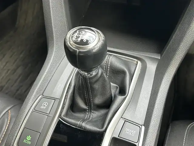 ホンダ シビック ハッチバック ホンダセンシング 静岡県 2019(令1)年 6.1万km クリスタルブラックパール 純正7インチナビ/（FM/AM/CD/DVD/iPod/Apple CarPlay）/フルセグTV/6速マニュアル/追従クルーズコントロール/ドラレコ/レーンキープアシスト/オートライト/LEDヘッドライト/シートヒーター/純正フロアマット/カーテンエアバッグ/衝突軽減システム/横滑り防止システム/純正18AW