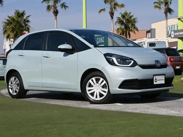 ホンダ フィット e:HEVホーム 千葉県 2024(令6)年 0.2万km フィヨルドミストパール ホンダセンシング/・衝突軽減ブレーキ（CMBS）/・車線維持支援システム（LKAS）/・アダプティブクルーズコントロール（ACC）/・後方誤発進抑制機能/・誤発進抑制機能/純正ナビ/地デジTV/【DVD/CD再生機能　Bluetooth接続】/バックカメラ/ドライブレコーダー/革巻きステアリング/ETC/LEDヘッドライト/ウインカーミラー/コーナーセンサー/サイド/カーテンエアバッグ/Honda スマートキー