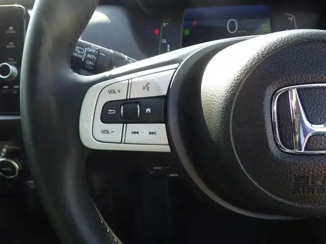 ホンダ フィット e:HEVホーム 千葉県 2024(令6)年 0.2万km フィヨルドミストパール ホンダセンシング/・衝突軽減ブレーキ（CMBS）/・車線維持支援システム（LKAS）/・アダプティブクルーズコントロール（ACC）/・後方誤発進抑制機能/・誤発進抑制機能/純正ナビ/地デジTV/【DVD/CD再生機能　Bluetooth接続】/バックカメラ/ドライブレコーダー/革巻きステアリング/ETC/LEDヘッドライト/ウインカーミラー/コーナーセンサー/サイド/カーテンエアバッグ/Honda スマートキー