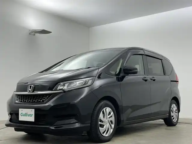 ホンダ フリード G ホンダセンシング 岡山県 2020(令2)年 3.5万km クリスタルブラックパール レーダークルーズコントロール/ビルトインETC/合皮シート/LEDヘッドライト/アクティブコーナーリングライト/シートヒーター/純正ナビ/（Bluetooth/フルセグTV/CD/DVD）/ドライブレコーダー/衝突軽減ブレーキシステム/両側電動スライドドア/バックカメラ