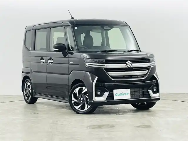 スズキ スペーシア カスタム HYBRID XS ターボ 宮城県 2024(令6)年 0.4万km アーバンブラウンパールメタリック スズキセーフティサポート/・アダプティブクルーズコントロール/・衝突被害軽減ブレーキ/・誤発進抑制装置/・車線逸脱警報装置/・オートマチックハイビーム/純正ナビゲーション/・型番：70T20/・フルセグTV/FM/AM/USB/・AppleCarPlay/AndoroidAuto/・バックカメラ/・アラウンドビューモニター/ハーフレザーシート/・ベンチシート/・D+N席シートヒーター/革巻きステアリング/・ステアリングリモコン/・ステアリングヒーター/・パドルシフト/両側パワースライドドア/アイドリングストップ/電動格納ミラー/・オートミラー/・ウィンカーミラー/プッシュスタート/・スマートキー/・スペアキー1本/LEDヘッドライト/・フォグランプ/・オートライト/・ヘッドライトレベライザー/SOSボタン/純正フロアマット/純正15インチAW