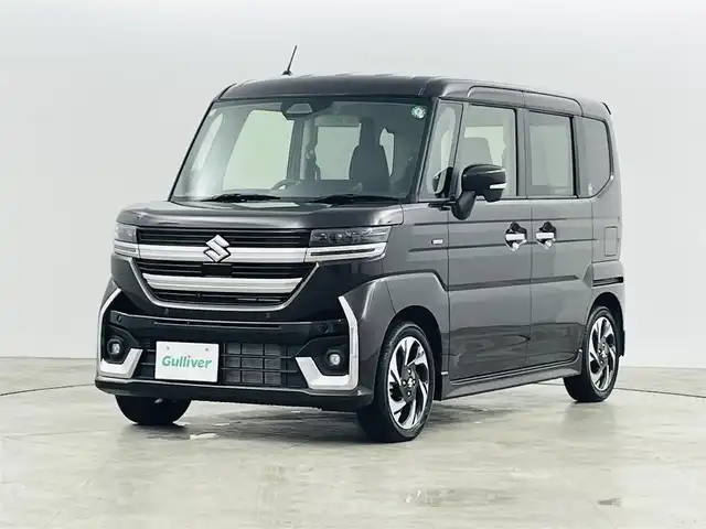 スズキ スペーシア カスタム HYBRID XS ターボ 宮城県 2024(令6)年 0.4万km アーバンブラウンパールメタリック スズキセーフティサポート/・アダプティブクルーズコントロール/・衝突被害軽減ブレーキ/・誤発進抑制装置/・車線逸脱警報装置/・オートマチックハイビーム/純正ナビゲーション/・型番：70T20/・フルセグTV/FM/AM/USB/・AppleCarPlay/AndoroidAuto/・バックカメラ/・アラウンドビューモニター/ハーフレザーシート/・ベンチシート/・D+N席シートヒーター/革巻きステアリング/・ステアリングリモコン/・ステアリングヒーター/・パドルシフト/両側パワースライドドア/アイドリングストップ/電動格納ミラー/・オートミラー/・ウィンカーミラー/プッシュスタート/・スマートキー/・スペアキー1本/LEDヘッドライト/・フォグランプ/・オートライト/・ヘッドライトレベライザー/SOSボタン/純正フロアマット/純正15インチAW