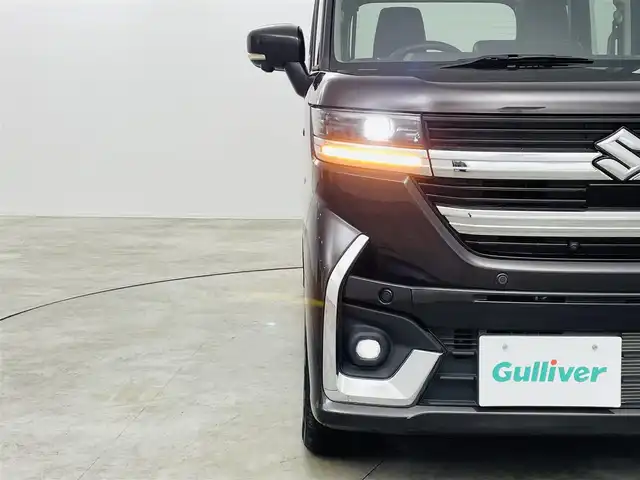 スズキ スペーシア カスタム HYBRID XS ターボ 宮城県 2024(令6)年 0.4万km アーバンブラウンパールメタリック スズキセーフティサポート/・アダプティブクルーズコントロール/・衝突被害軽減ブレーキ/・誤発進抑制装置/・車線逸脱警報装置/・オートマチックハイビーム/純正ナビゲーション/・型番：70T20/・フルセグTV/FM/AM/USB/・AppleCarPlay/AndoroidAuto/・バックカメラ/・アラウンドビューモニター/ハーフレザーシート/・ベンチシート/・D+N席シートヒーター/革巻きステアリング/・ステアリングリモコン/・ステアリングヒーター/・パドルシフト/両側パワースライドドア/アイドリングストップ/電動格納ミラー/・オートミラー/・ウィンカーミラー/プッシュスタート/・スマートキー/・スペアキー1本/LEDヘッドライト/・フォグランプ/・オートライト/・ヘッドライトレベライザー/SOSボタン/純正フロアマット/純正15インチAW