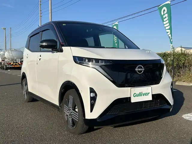 日産 サクラ G 栃木県 2023(令5)年 1.5万km アメジストブラック/シルキーホワイト 純正メーカーオプションナビ/レーダークルーズコントロール/アラウンドビューモニター/プロパイロットパーキング/D席シートヒーター/LEDヘッドライト/ETC2.0/前後コーナーセンサー/レーンキープアシスト/純正フロアマット/充電コード/純正１５インチアルミホイール