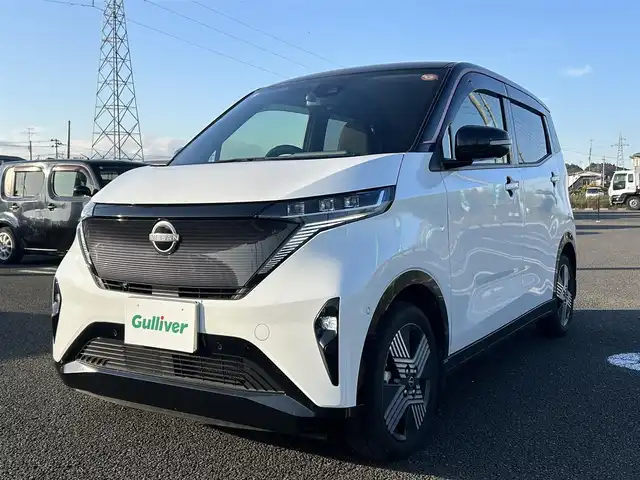 日産 サクラ G 栃木県 2023(令5)年 1.5万km アメジストブラック/シルキーホワイト 純正メーカーオプションナビ/レーダークルーズコントロール/アラウンドビューモニター/プロパイロットパーキング/D席シートヒーター/LEDヘッドライト/ETC2.0/前後コーナーセンサー/レーンキープアシスト/純正フロアマット/充電コード/純正１５インチアルミホイール