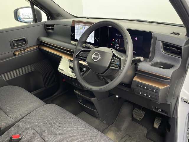 日産 サクラ G 栃木県 2023(令5)年 1.5万km アメジストブラック/シルキーホワイト 純正メーカーナビ/（BT/CD/DVD/AM/FM）/全周囲カメラ/レーダークルーズコントロール/アラウンドビューモニター/プロパイロットパーキング/D席シートヒーター/LEDヘッドライト/ETC2.0/前後コーナーセンサー/レーンキープアシスト/純正フロアマット/充電コード/純正１５インチアルミホイール/プッシュスタート/スマートキー