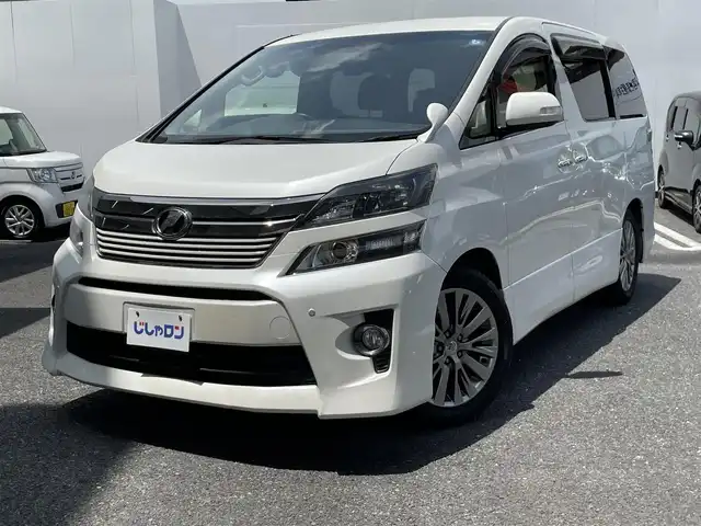 トヨタ ヴェルファイア 2．4Z ゴールデンアイズ 埼玉県 2012(平24)年 11.5万km ホワイトパールクリスタルシャイン (株)IDOMが運営する【じしゃロン鳩ヶ谷店】の自社ローン専用車両になりますこちらは現金またはオートローンご利用時の価格です。自社ローンご希望の方は別途その旨お申付け下さい/純正SDナビ【CD/DVD/Bluetooth/HDD/SD/USB/App】/フルセグTV/バックカメラ/両側パワースライドドア/ETC/クルーズコントロール/前後コーナーセンサー/ハーフレザーシート/オットマン/純正18インチアルミホイール/HIDヘッドライト/オートライト/取説、保証書