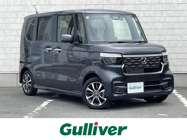 ホンダ Ｎ ＢＯＸ カスタム 愛知県 2024(令6)年 0.1万km メテオロイドグレーメタリック ・純正SDメモリーナビ/・バックカメラ/・フルセグTV/・CD/DVD再生/・ETC（新セキュリティ対応）/・ミュージックサーバー（HDD録音）/・Bluetooth/USB接続/・両側パワースライドドア/・純正フロアマット/・純正14インチアルミホイール/・LEDヘッドライト/・コーナーセンサー/・横滑り防止装置/・衝突軽減ブレーキ/・ブレーキホールド/・ドライブレコーダー/・充電用USBポート（1個）/・アダプティブクルーズコントロール