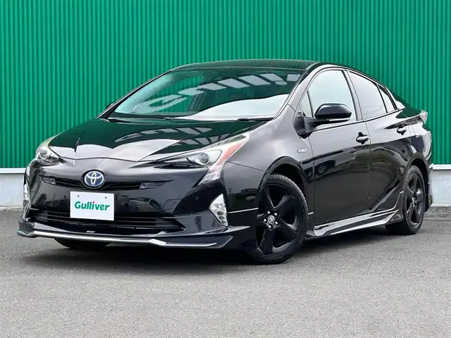 トヨタ プリウス A ツーリングセレクション 宮城県 2016(平28)年 9.8万km アティチュードブラックマイカ モデリスタエアロ（F/S/R）/セーフティセンスP/・プリクラッシュセーフティ/・レーンディパーチャーアラート/・オートマチックハイビーム/・レーダークルーズコントロール/ブラインドスポットモニター/インテリジェントクリアランスソナー/シンプルインテリジェントパーキングアシスト/ヘッドアップディスプレイ/純正ナビ（NSZT-W64）/・CD/DVD/・Bluetooth/・フルセグTV/バックカメラ/ビルトインETC/ブラック合皮シート/シートヒーター/革巻きステアリング/ステアリングスイッチ/LEDヘッドランプ/フォグランプ/オートライト/スマートキー＆プッシュスタート/電動格納ミラー/純正17インチAW/純正フロアマット/トノカバー/W/サイド/カーテンエアバッグ