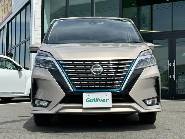 日産 セレナ e－パワー ハイウェイスター V 愛媛県 2020(令2)年 3.7万km カシミヤグレージュ Strada7型ナビ/社外12インチ天吊モニター/両側電動スライド/左側ハンズフリースライド/プロパイロット/全周囲カメラ/クリアランスソナー/ドライブレコーダー/インテリジェントルームミラー/ブラインドスポットモニター/電動パーキングブレーキ/AutoHold/LEDヘッドライト/電格ミラー/純正ドアバイザー/ISOFIX/現状サマー(純正AW)(195/65/R15)/DUNLOP ENASAVE EC300＋