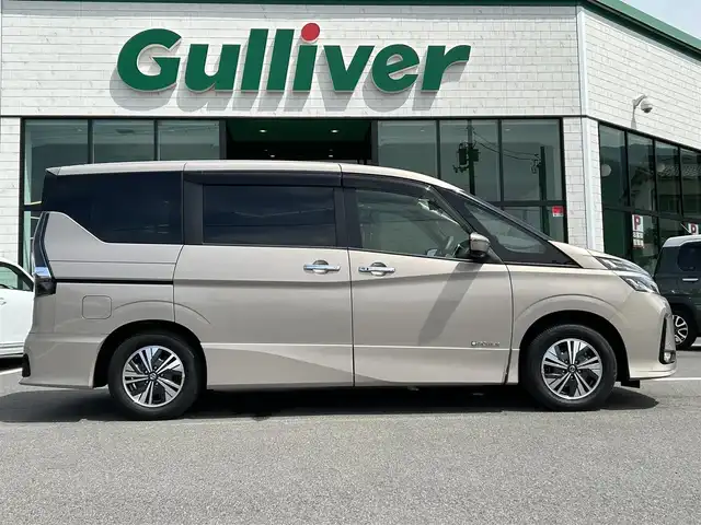 日産 セレナ e－パワー ハイウェイスター V 愛媛県 2020(令2)年 3.7万km カシミヤグレージュ Strada7型ナビ/社外12インチ天吊モニター/両側電動スライド/左側ハンズフリースライド/プロパイロット/全周囲カメラ/クリアランスソナー/ドライブレコーダー/インテリジェントルームミラー/ブラインドスポットモニター/電動パーキングブレーキ/AutoHold/LEDヘッドライト/電格ミラー/純正ドアバイザー/ISOFIX/現状サマー(純正AW)(195/65/R15)/DUNLOP ENASAVE EC300＋