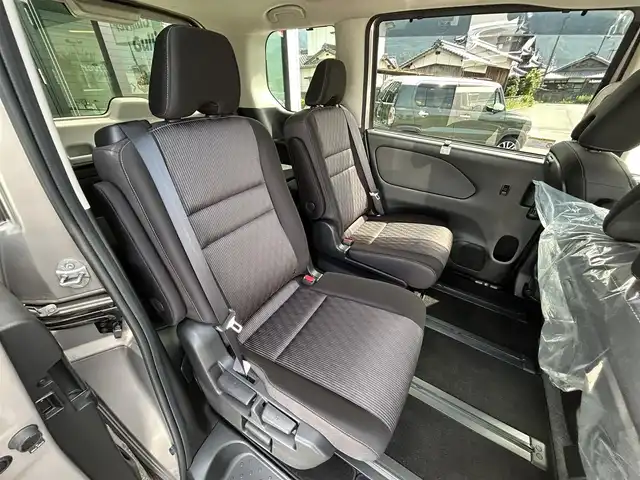 日産 セレナ e－パワー ハイウェイスター V 愛媛県 2020(令2)年 3.7万km カシミヤグレージュ Strada7型ナビ/社外12インチ天吊モニター/両側電動スライド/左側ハンズフリースライド/プロパイロット/全周囲カメラ/クリアランスソナー/ドライブレコーダー/インテリジェントルームミラー/ブラインドスポットモニター/電動パーキングブレーキ/AutoHold/LEDヘッドライト/電格ミラー/純正ドアバイザー/ISOFIX/現状サマー(純正AW)(195/65/R15)/DUNLOP ENASAVE EC300＋