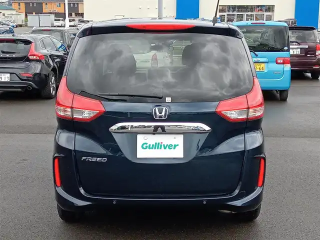 ホンダ フリード G ホンダセンシング 福井県 2021(令3)年 1.5万km ミッドナイトブルービームM 後席用フリップダウンモニター/純正9インチナビ/フルセグテレビ/アダプティブクルーズコントロール/前方ドライブレコーダー/ビルトインETC/両側パワースライドドア/バックカメラ/LEDヘッドライト/前席シートヒーター/衝突被害軽減システム/レーンキープアシスト/横滑り防止装置/盗難防止装置/ワイパーデアイサー/サンシェード/電格ミラー/純正ホイルキャップ/純正フロアマット/スマートキー