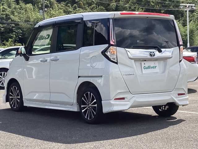 トヨタ ルーミー カスタムG－T 佐賀県 2021(令3)年 3.7万km パールホワイトⅢ TRDエアロ/純正9インチナビ/パノラマミックビューモニター/両側パワースライドドア/プリクラッシュセーフティ/レーンディパーチャーアラート/オートハイビーム/アダプティブクルーズコントロール/コーナーセンサー/電動パーキングブレーキ/オートブレーキホールド/ETC/ドライブレコーダー/ステアリングリモコン/プッシュスタート/スマートキー/LEDヘッドライト/フォグライト/純正アルミホイール