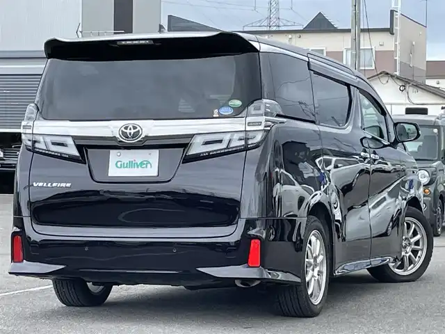 トヨタ ヴェルファイア Z Gエディション 道央・札幌 2019(令1)年 4.6万km バーニングブラッククリスタルシャインガラスフレーク ４WD/純正ディーラーOPナビ/CD/DVD/BT/フルセグ/トヨタセーフティセンス/プリクラッシュセーフティ/横滑り防止装置/レーダークルーズコントロール/レーンキープアシスト/クリアランスソナー/ブラインドスポットモニター/パーキングサポートブレーキ/ロードサインアシスト/バックカメラ/ビルトインETC2.0/ドライブレコーダー/アイドリングストップ/ECOMODE/両側パワースライドドア/パワーバックドア/前席/２列目パワーシート/D席メモリーシート/前席シートヒーター/前席エアシート/レザーシート/革巻きウッドコンビステアリング/ステアリングリモコン/ハンドルヒーター/AC100V/電動パーキング/ブレーキホールド/MTモード付AT/プッシュスタート/スマートキー/LEDヘッドライト/オートライト/フォグランプ/電動格納ミラー/ウィンカーミラー/フロアマット/ドアバイザー/純正AW付夏タイヤ積込/235/50/R18/2019年/山6mm