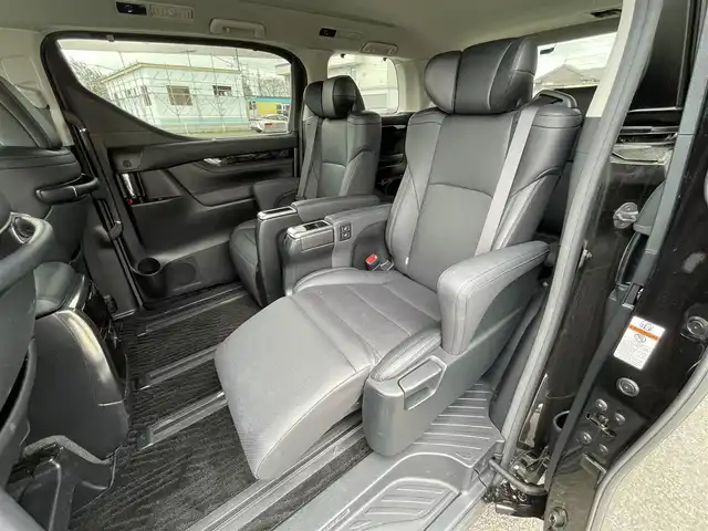 トヨタ ヴェルファイア Z Gエディション 道央・札幌 2019(令1)年 4.6万km バーニングブラッククリスタルシャインガラスフレーク ４WD/純正ディーラーOPナビ/CD/DVD/BT/フルセグ/トヨタセーフティセンス/プリクラッシュセーフティ/横滑り防止装置/レーダークルーズコントロール/レーンキープアシスト/クリアランスソナー/ブラインドスポットモニター/パーキングサポートブレーキ/ロードサインアシスト/バックカメラ/ビルトインETC2.0/ドライブレコーダー/アイドリングストップ/ECOMODE/両側パワースライドドア/パワーバックドア/前席/２列目パワーシート/D席メモリーシート/前席シートヒーター/前席エアシート/レザーシート/革巻きウッドコンビステアリング/ステアリングリモコン/ハンドルヒーター/AC100V/電動パーキング/ブレーキホールド/MTモード付AT/プッシュスタート/スマートキー/LEDヘッドライト/オートライト/フォグランプ/電動格納ミラー/ウィンカーミラー/フロアマット/ドアバイザー/純正AW付夏タイヤ積込/235/50/R18/2019年/山6mm